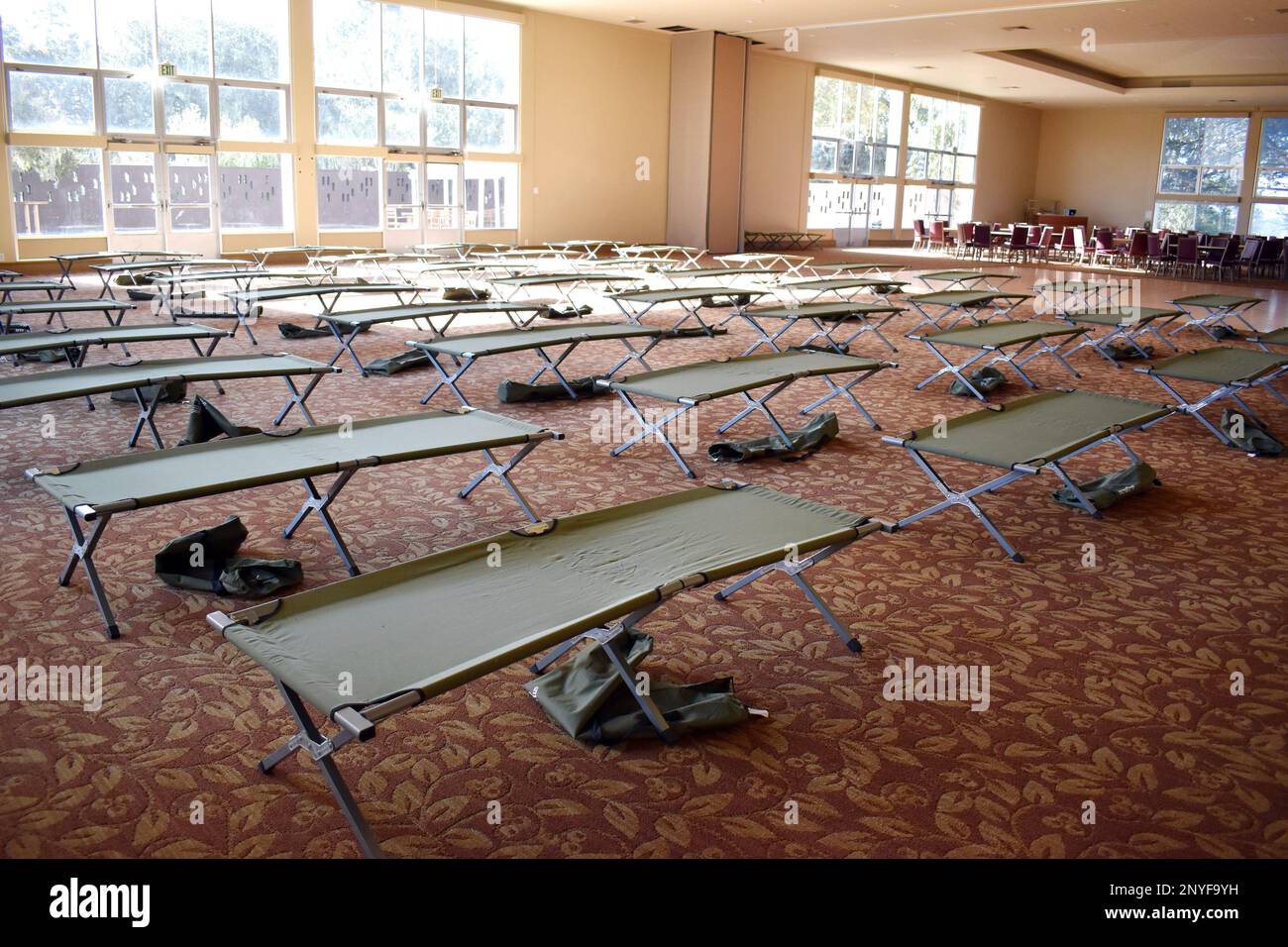 Cots stand ready for use in a prepared shelter at the Gen. Stilwell Community Center, Ord