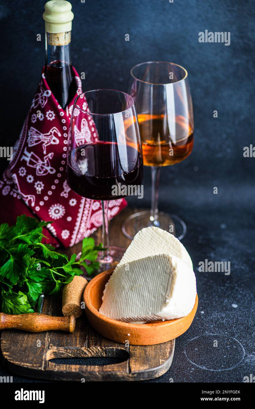 White and red Georgian wine in the glasses on concrete background Stock Photo