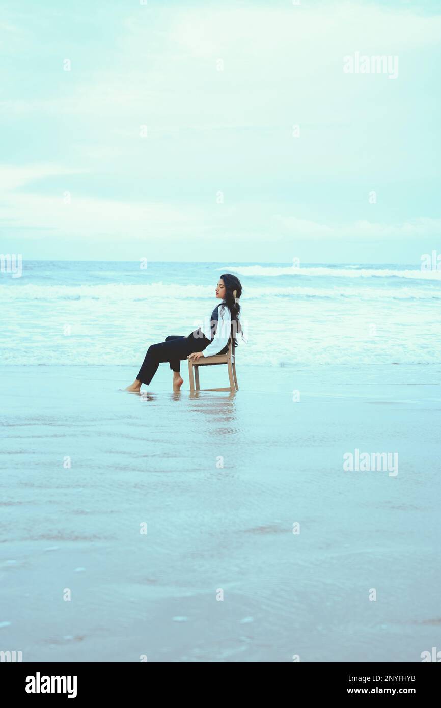 Sit and relax eyes closed woman chair hi-res stock photography and ...