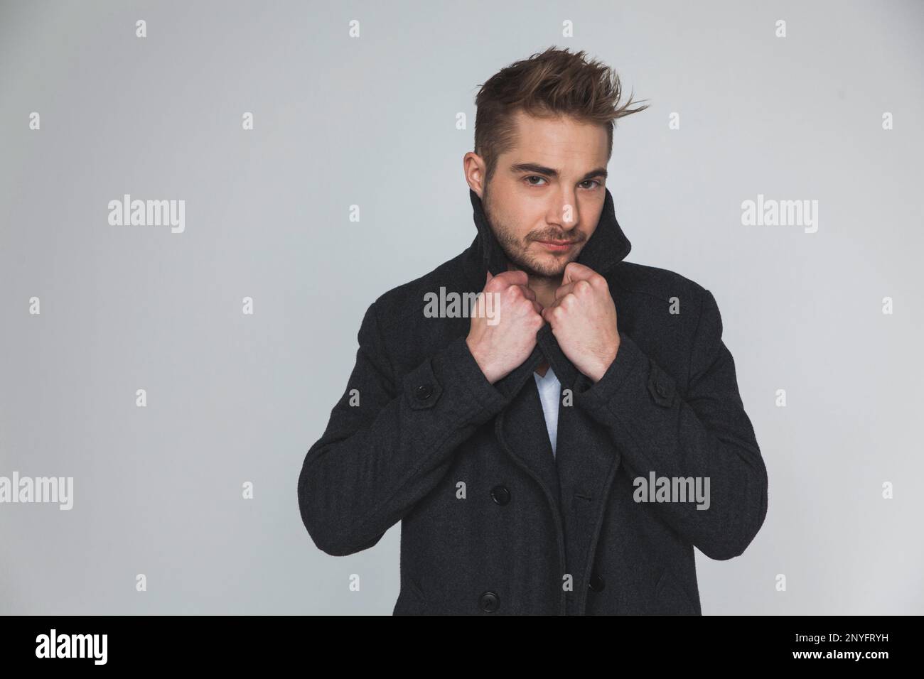 Man looking stylish at camera hi-res stock photography and images - Alamy