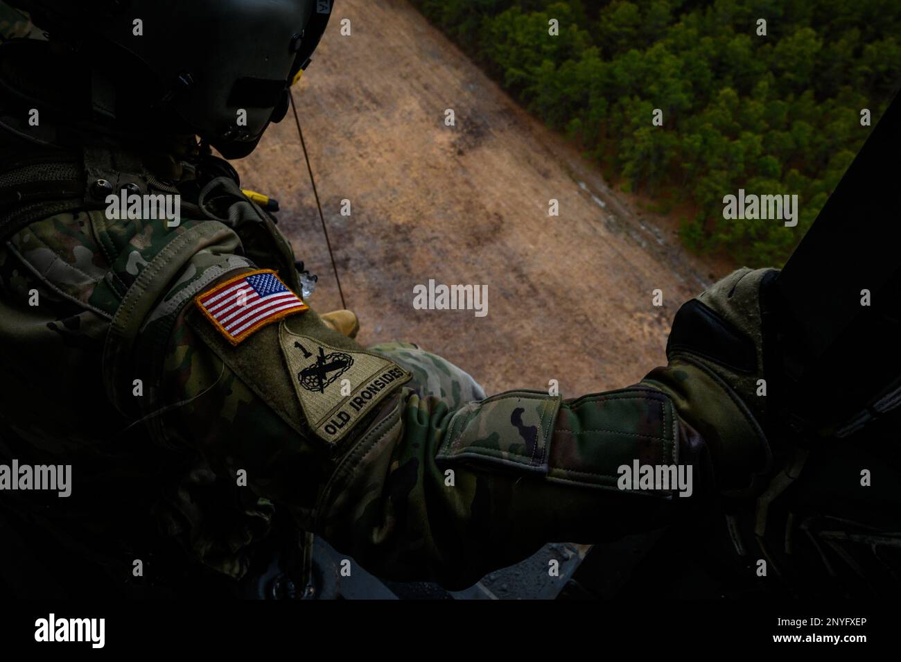 U.S. Army Staff Sgt. Anthony Marotta, right, and Sgt. Jeff Angle, UH-60L  Black Hawk helicopter crew chiefs with the New Jersey National Guard's  1-150th Assault Helicopter Battalion, conduct gear checks before hoist