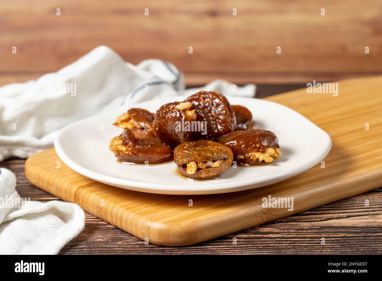 Walnut stuffed figs. Traditional Turkish sweets. Fig dessert with
