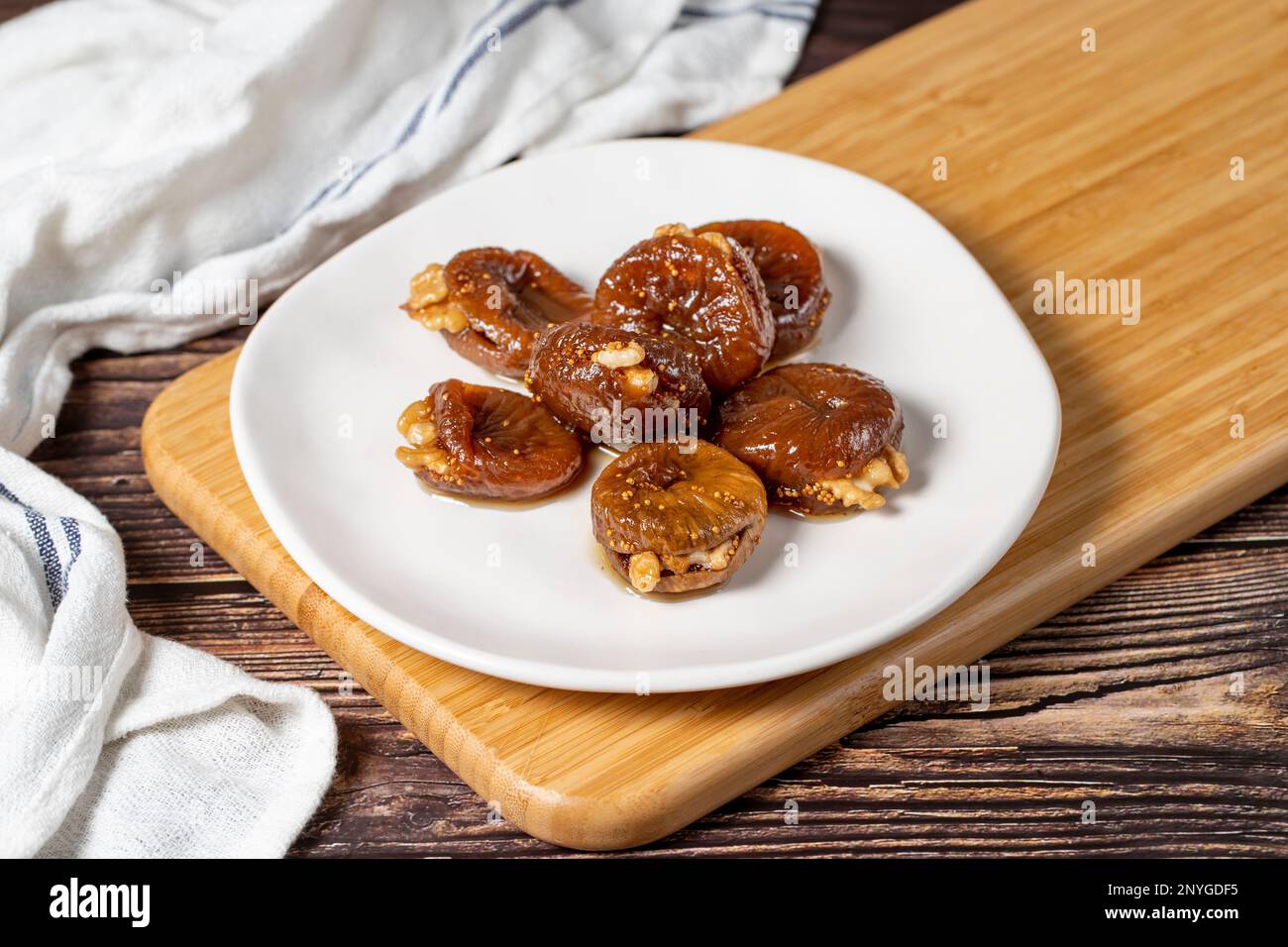 Walnut stuffed figs. Traditional Turkish sweets. Fig dessert with
