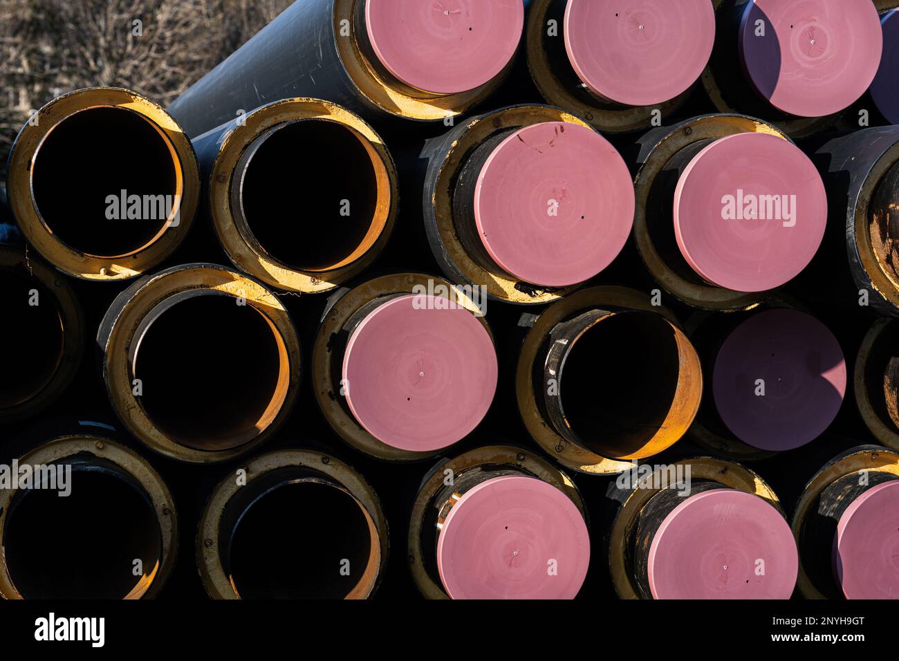 Metal drinking water pipes with plastic covers Stock Photo Alamy