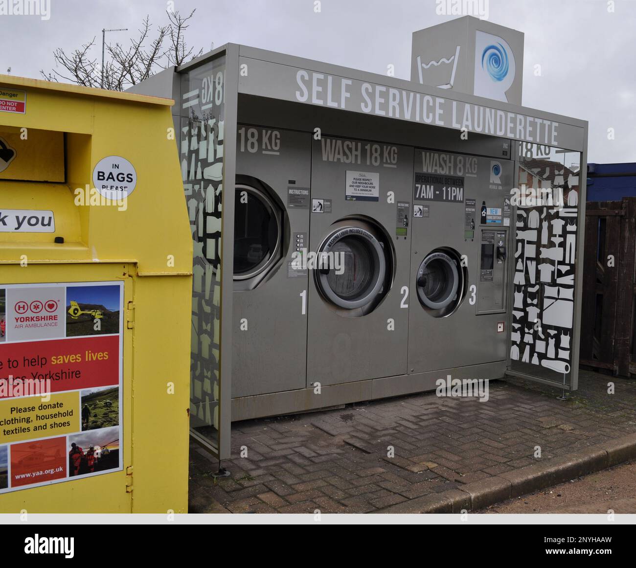 Outdoor laundromat (laundry) on petrol station forecourt in Hull (England) Stock Photo