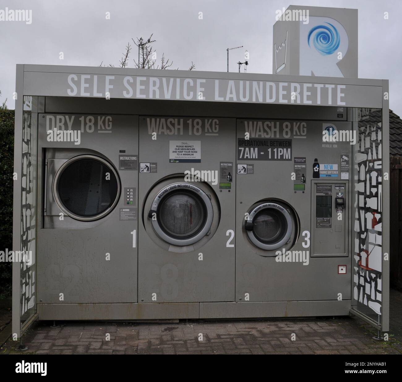 Outdoor laundromat (laundry) on petrol station forecourt in Hull (England) Stock Photo