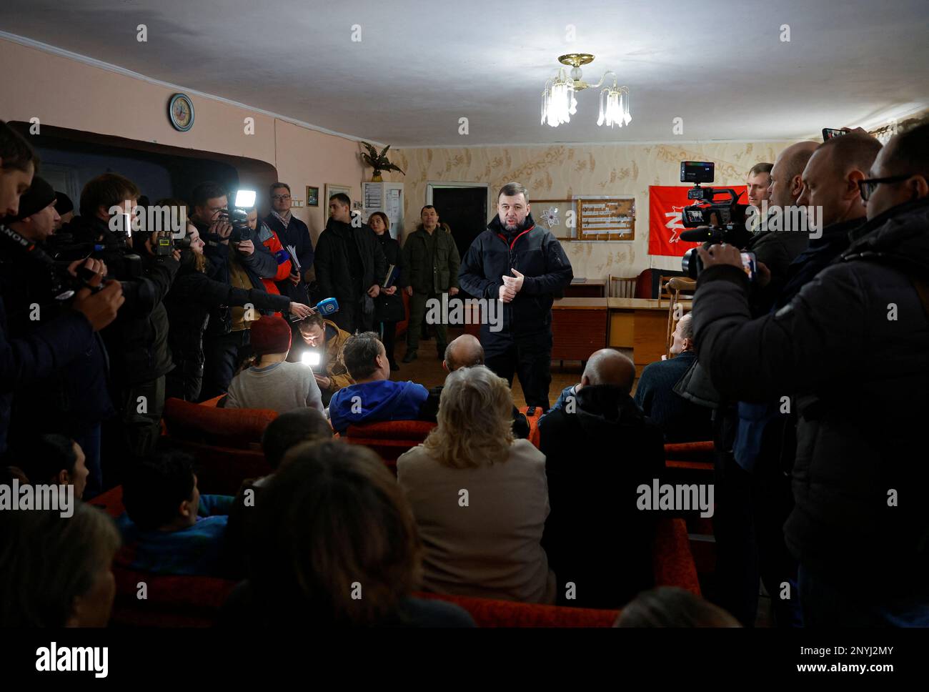 Denis Pushilin, Moscow-installed acting leader of the Russian-controlled parts of Ukraine's Donetsk region, meets with civilians evacuated from Bakhmut district in the course of Russia-Ukraine conflict, at a temporary accommodation centre in a local dormitory in Shakhtarsk (Shakhtyorsk) in the Donetsk Region, Russian-controlled Ukraine, March 2, 2023. REUTERS/Alexander Ermochenko Stock Photo