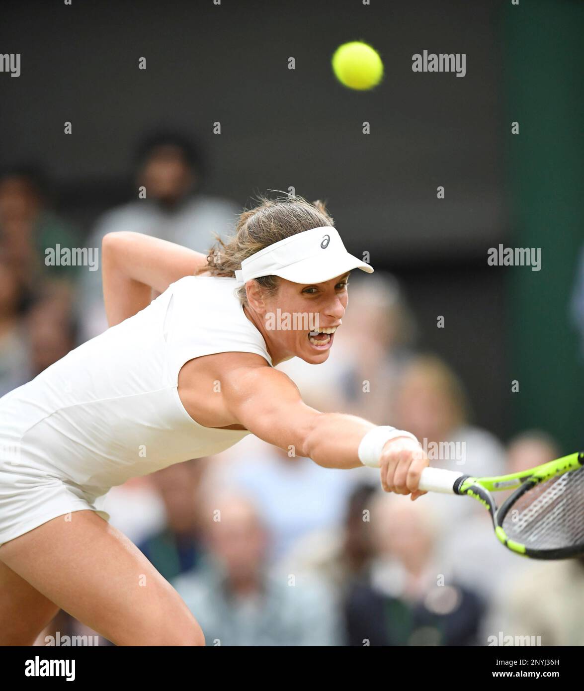 Johanna Konta of U.K. hits a shot during the ladies' singles quarter-finals  of the Wimbledon tennis tournament against Simona Halep of Romania at All  England Tennis Club in London on July 11,