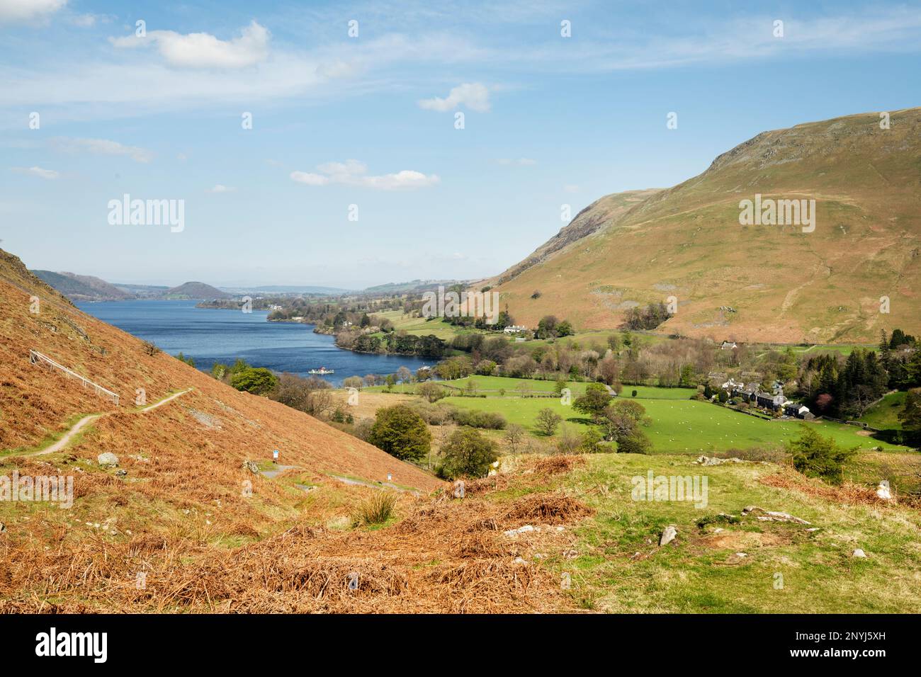 Looking down Ullswater to Pooley Bridge from The Hause, Martindale,  the Lake District,Cumbria. Dunmallard Hill at the foot of Ullswater in distance Stock Photo