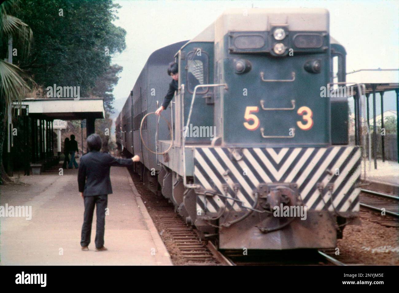 Southbound diesel engine and train, Number 53, platform of Tai Po Kau