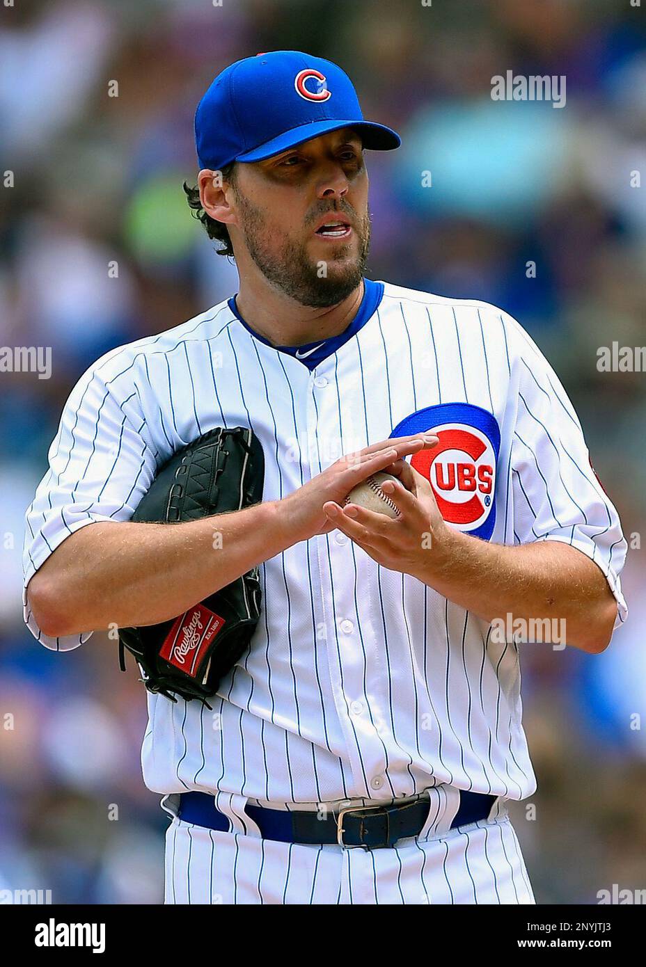CHICAGO, IL - JULY 05: Chicago Cubs starting pitcher John Lackey (41) wipes  the ball during the game between the Tampa Bay Rays and the Chicago Cubs on  July 5, 2017 at