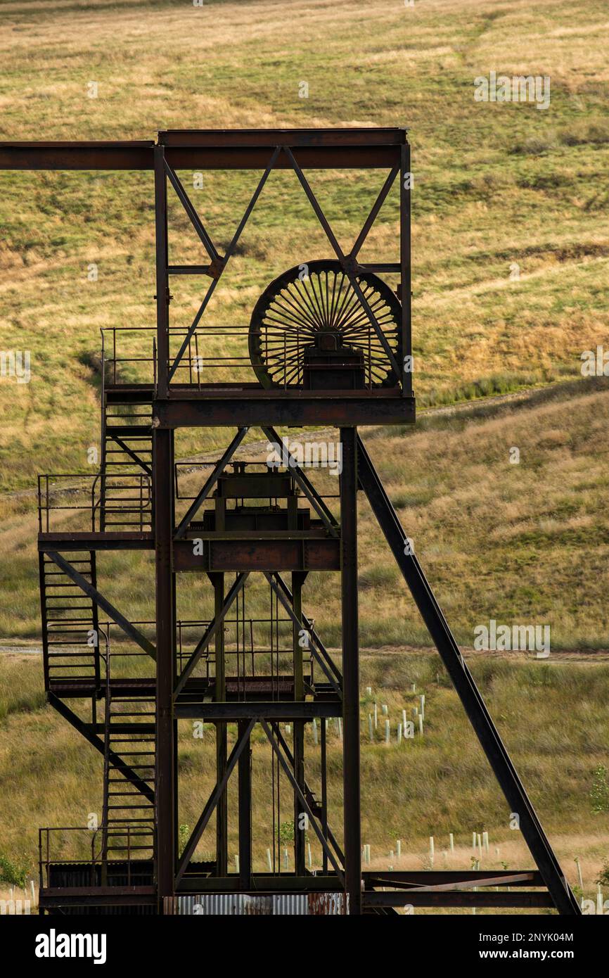 Abandoned buildings and winding gear at Groverake fluorspar and lead mine, Rookhope, County Durham Stock Photo