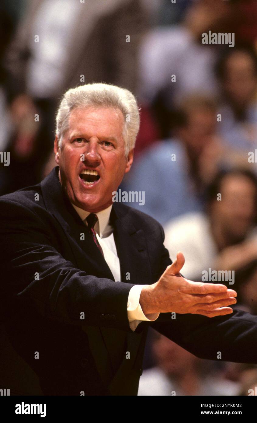 Miami Heat coach Kevin Loughery directs play during an NBA basketball