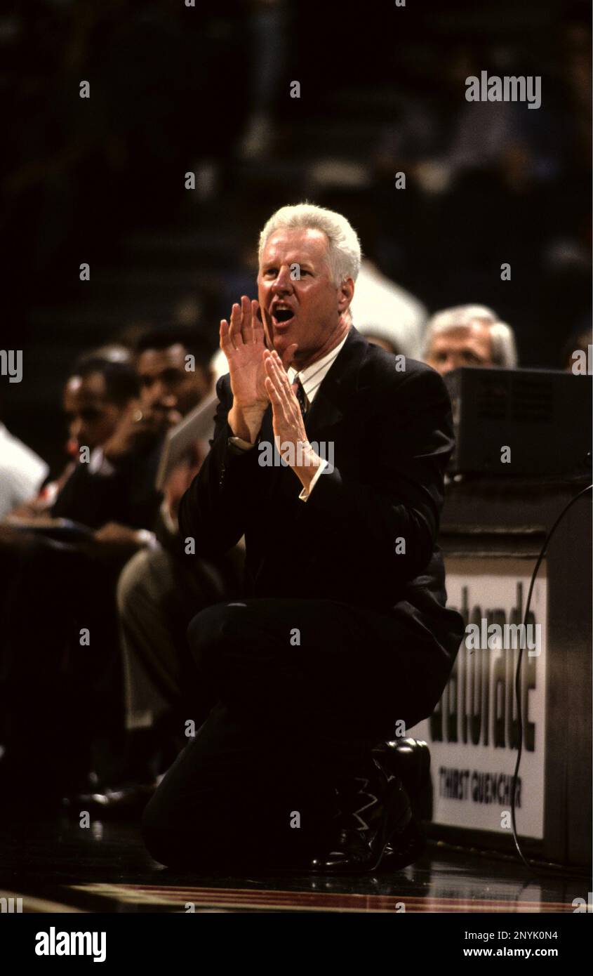 Miami Heat coach Kevin Loughery directs play during an NBA basketball