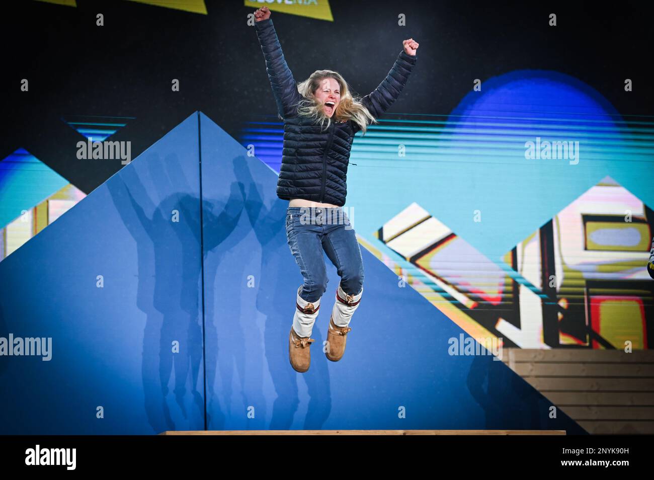 American cross country skier Jessie Diggins leaps with her gold FIS