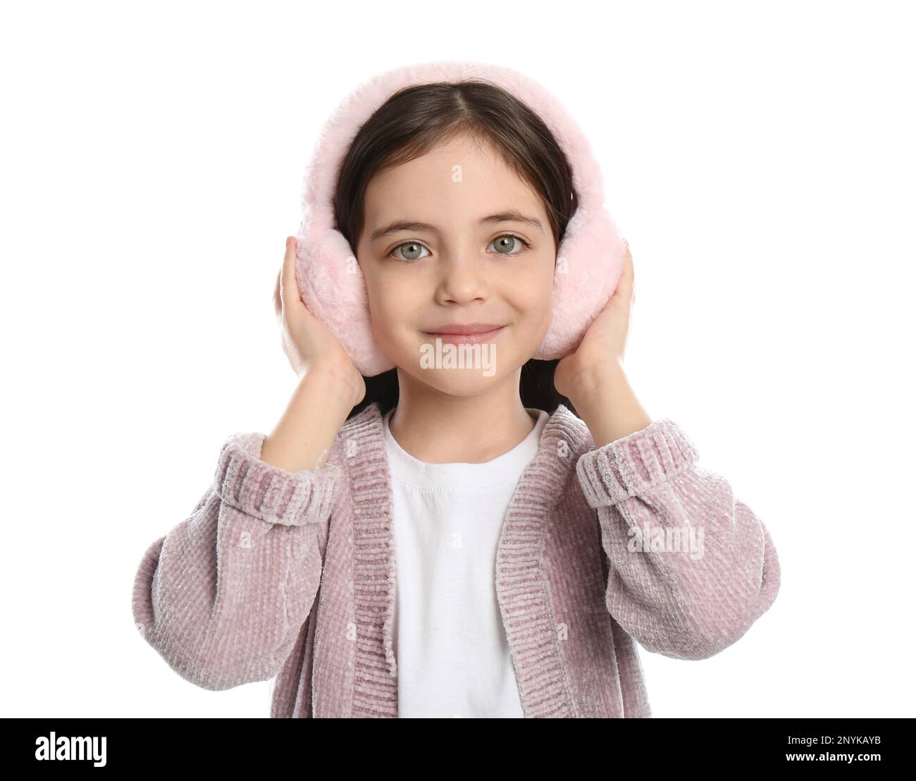 Cute girl wearing stylish earmuffs on white background Stock Photo Alamy