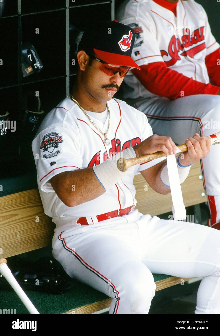 14 May, 1994: Cleveland Indians infielder Carlos Baerga (8) puts tape on  his bat before a game against the Detroit Tigers played at Jacobs Field in  Cleveland, OH. (Photo By John Cordes/Icon