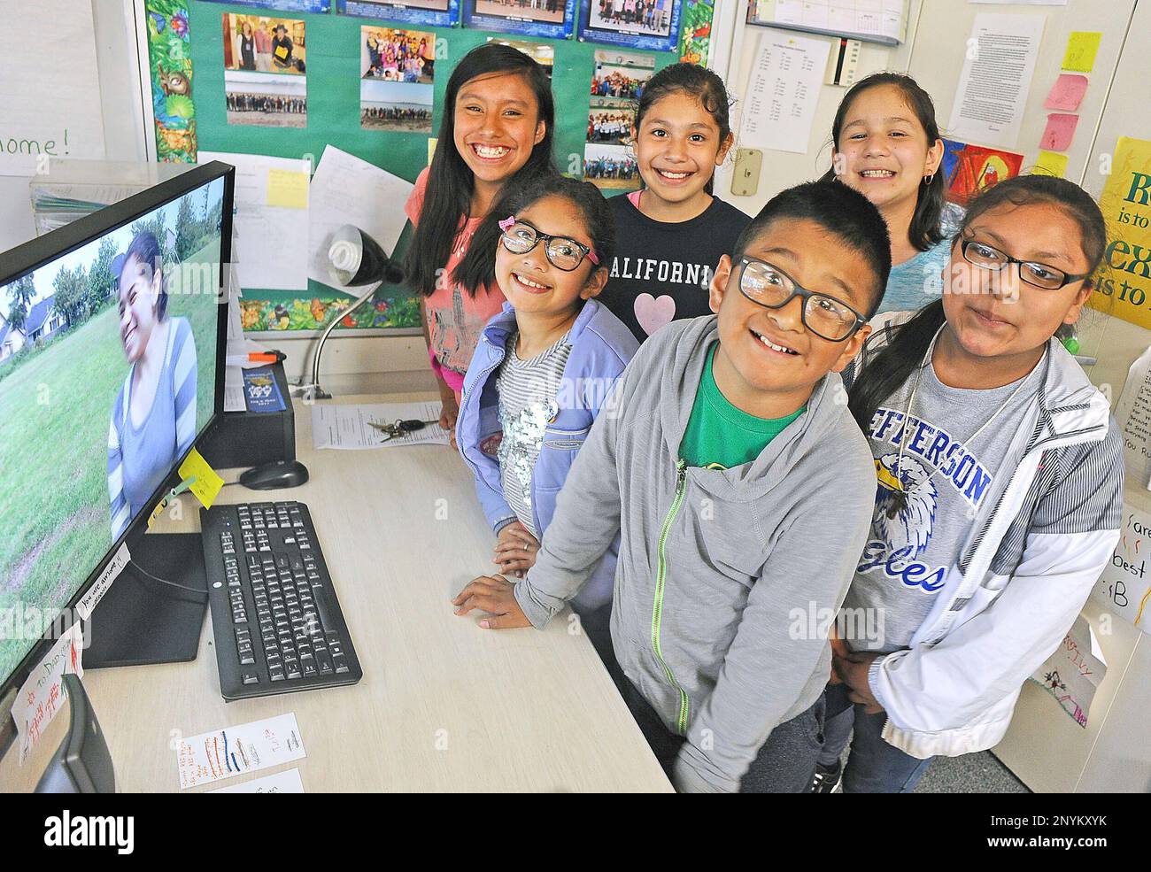 ADVANCE FOR WEEKEND EDITIONS JULY 1-2, 2017 - In this June 8, 2017 photo,  Jefferson Elementary School sixth graders, from left, Gladys Espinoza,  Anahi Villa, Suri Valles, Samuel Solano, Kimberly Madera and