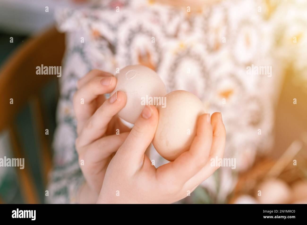 easter holiday time in spring season. traditional children hands are