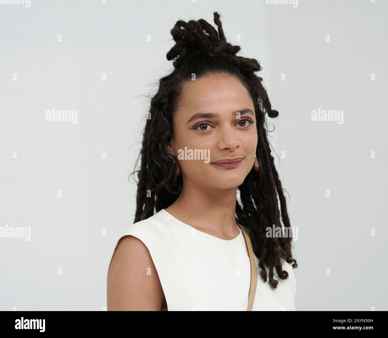 Sasha Lane poses for photographers upon arrival at the Chloe Fall