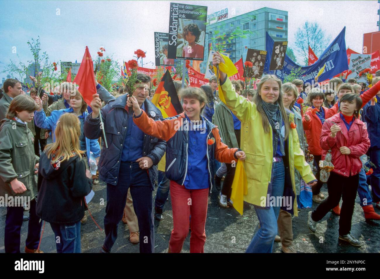 Germany, Berlin; schoolchildren in a communist parade in East Berlin during labour day at the 1st of May, 1980 Stock Photo