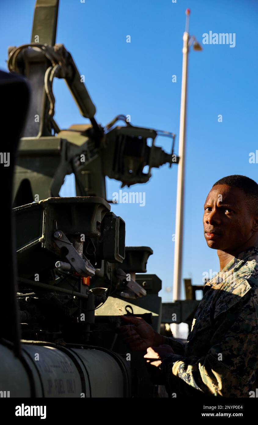 U.S. Marine Corps Sgt. Joe Okal, a motor vehicle operator with Marine Aircraft Group 41 (MAG-41), conducts a tour at Naval Air Station Joint Reserve Base Fort Worth, Texas, Jan. 12, 2023. MAG-41 operates from 8 sites in 6 states and is assigned 75 rotary-wing, fixed-wing, and tilt-rotor aircraft. Over 3,000 Marines and Sailors assigned to 9 squadrons provide combat forces in overseas contingency operations, theater security cooperation missions, unit deployment program, training exercises, and daily tasking to provide operational support to the active component. Stock Photo