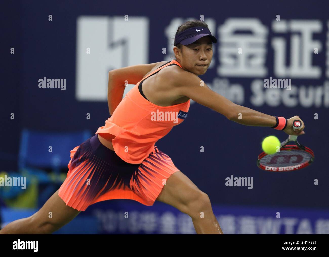 FILE--Zhang Shuai of China returns a shot to Petra Kvitova of Czech Republic in their semifinal match of the womens singles during the 2016 WTA Elite Trophy tennis tournament in Zhuhai city,