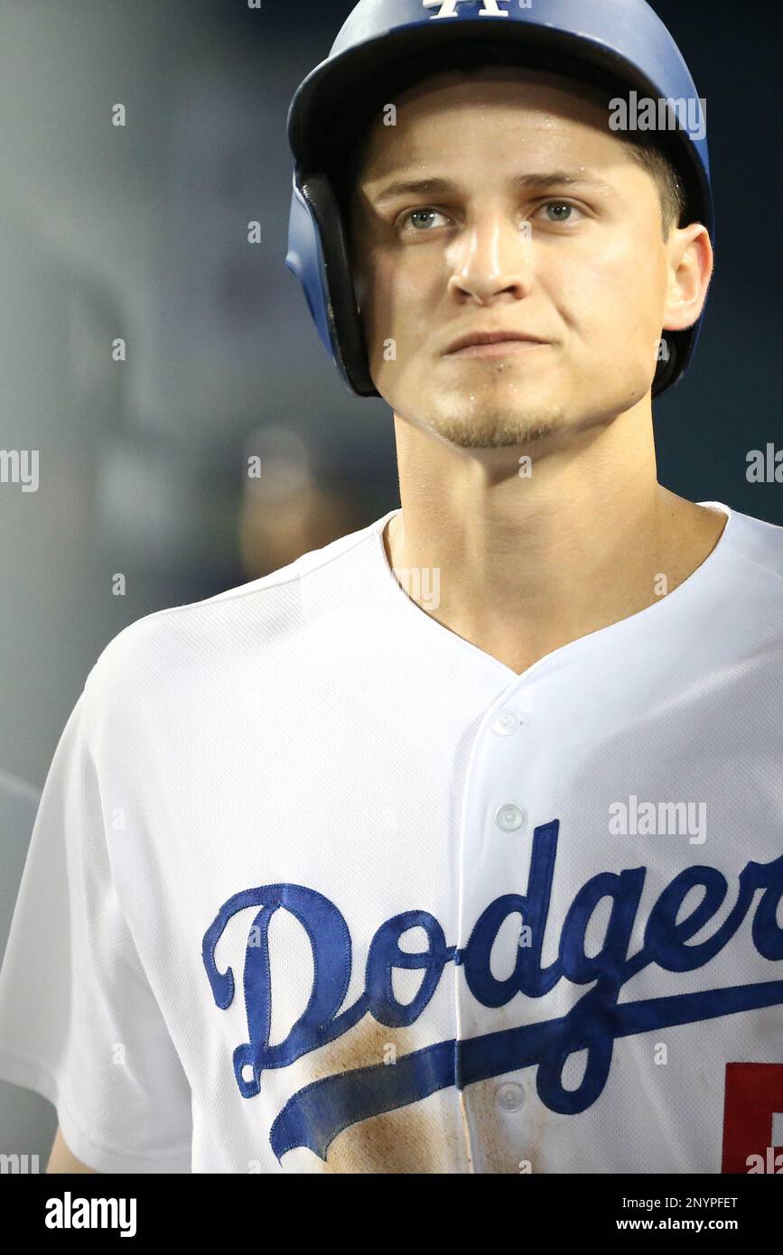 Los Angeles, United States. 19th Aug, 2021. Los Angeles Dodgers' short stop  Corey Seager (5) celebrates with manager Dave Robets (30) after hitting a  two-RBI home run off Pittsburgh Pirates' relief pitcher