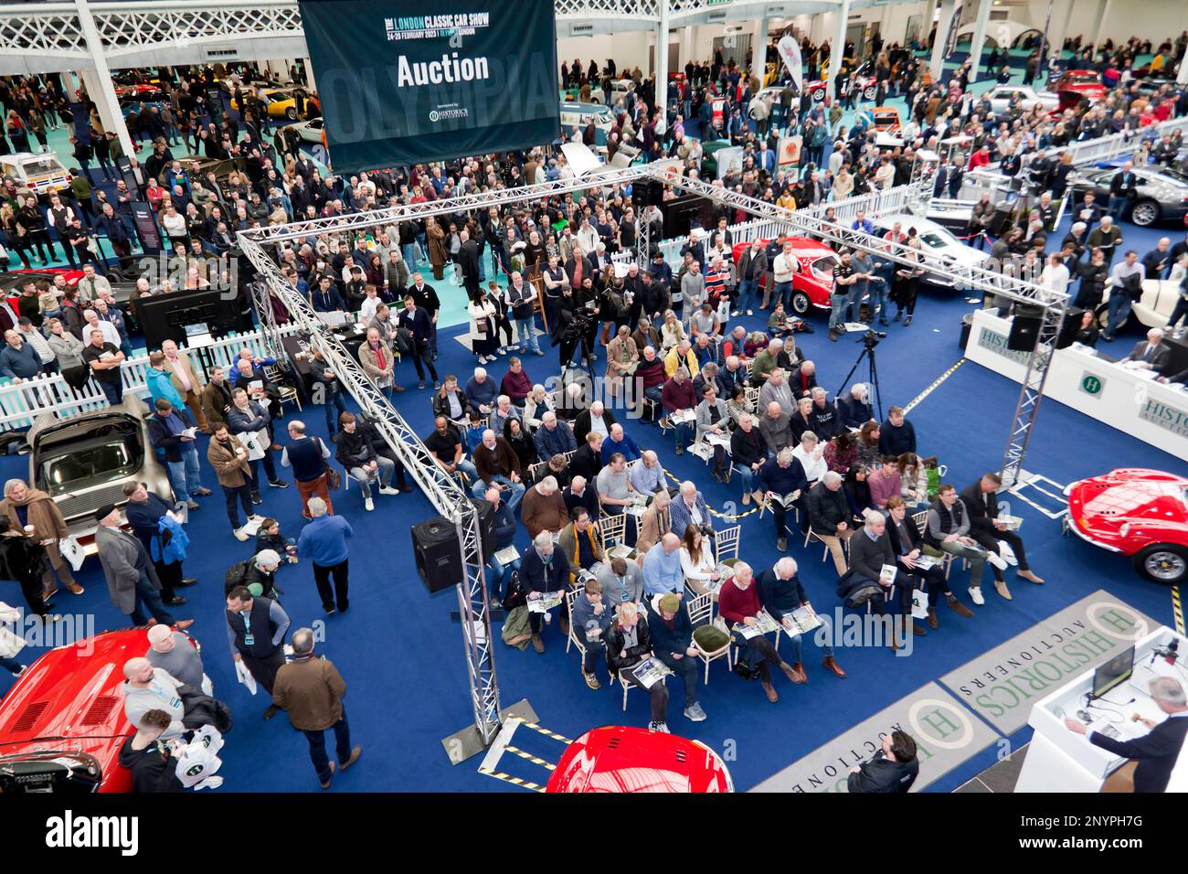 Full House at the 2023, London Classic Car Show live Auction, led by