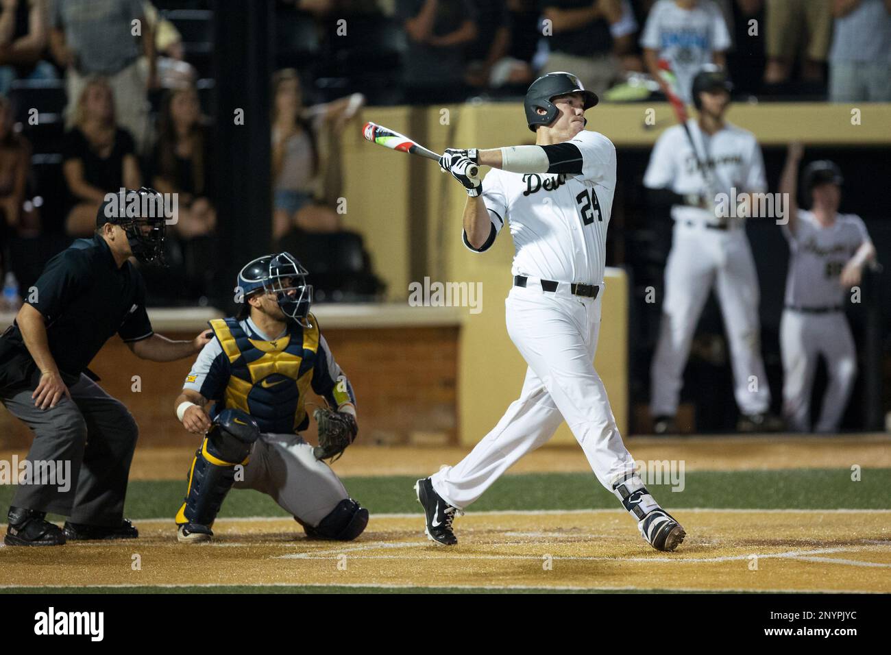 Gavin Sheets (24) of the Wake Forest Demon Deacons lines the game winning  hit into right field in the bottom of the 9th inning against the West  Virginia Mountaineers in Game Four