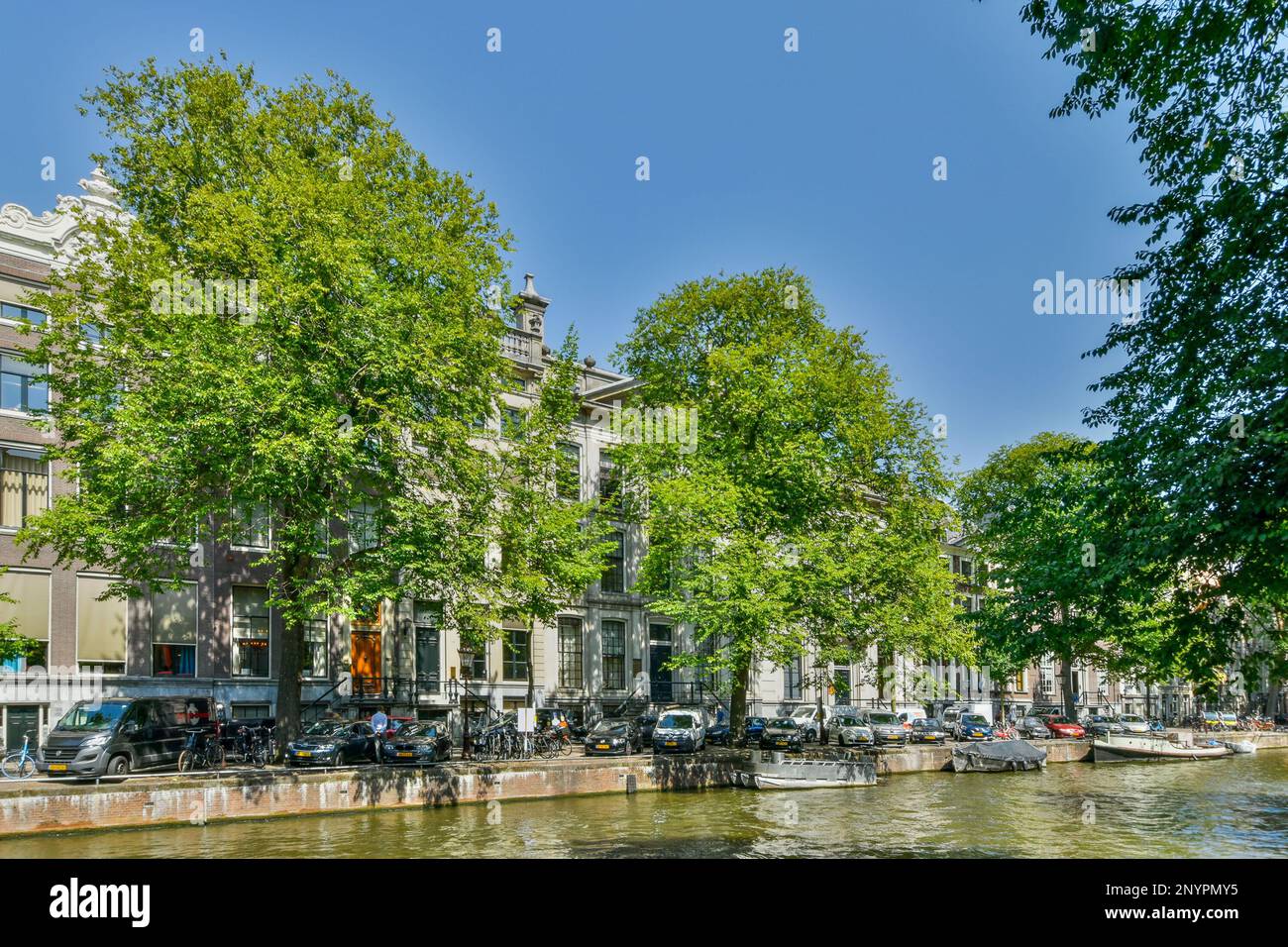 Amsterdam, Netherlands - 10 April, 2021: some buildings and trees on ...