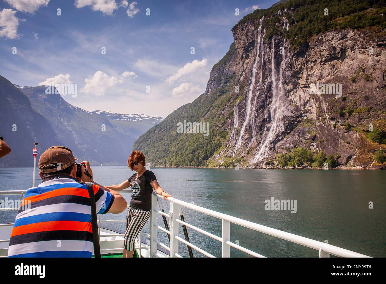 Tourists And Waterfall Seven Sisters, Ferry Between Geiranger And ...