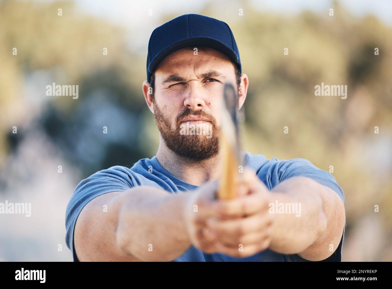 Target, focus and axe throwing with man in nature and aim for sports