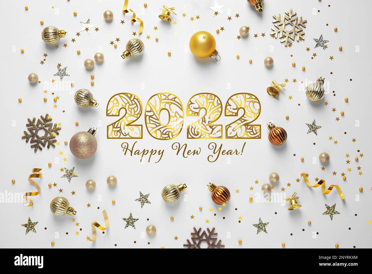 Happy New 2022 Year! Flat lay composition with decorations on white background Stock Photo