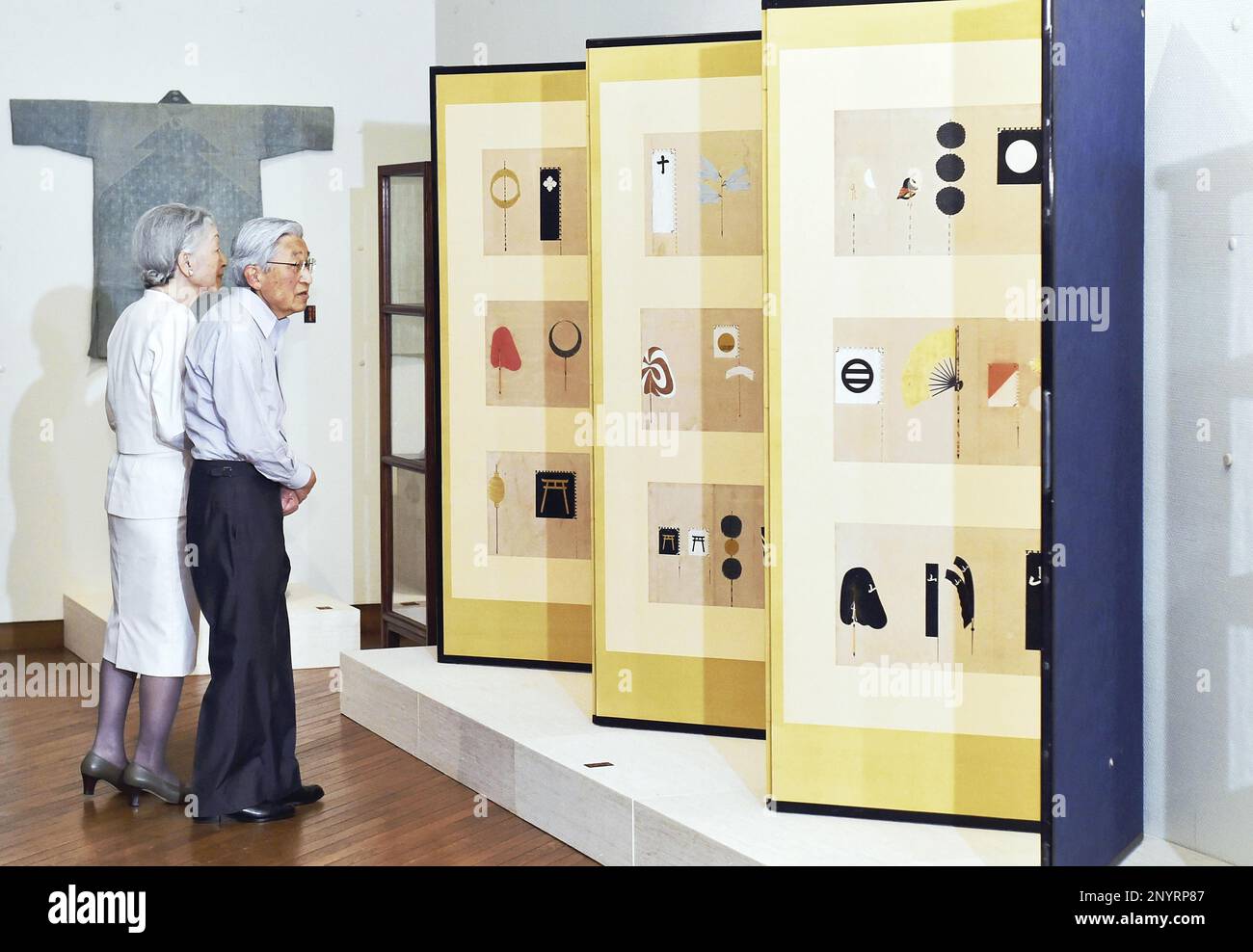 Japanese Emperor Akihito and Empress Michiko visit the Japan Folk Craft