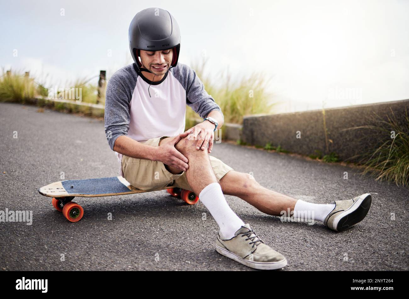 Injury, man and knee pain after skateboarding fall, sports practice and  learning to skate. Active, bad and skateboarder with a sprain, broken bone  or Stock Photo - Alamy