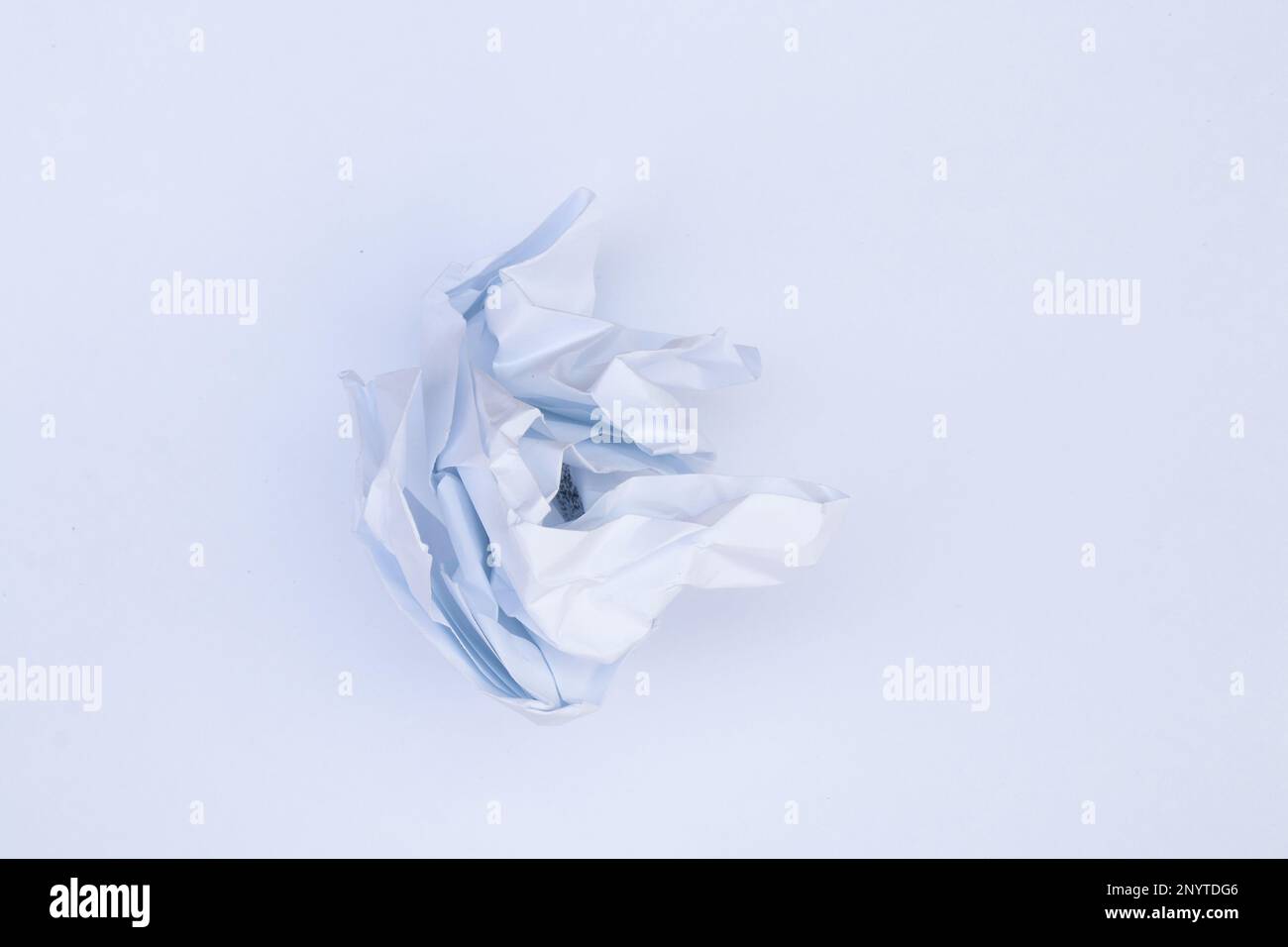 crumpled white paper on an isolated background Stock Photo