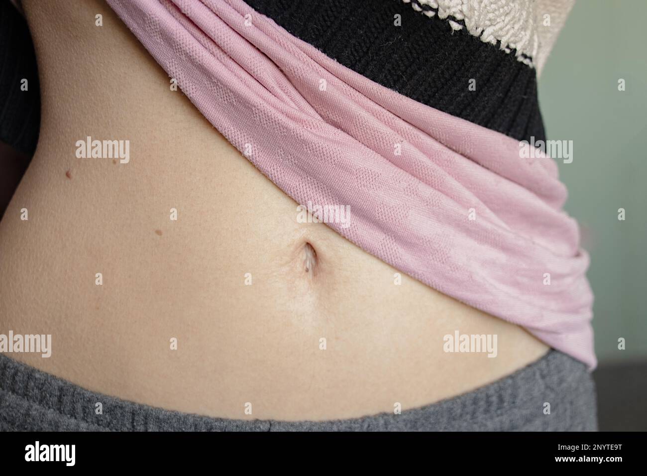 belly of a young girl with a belly button closeup Stock Photo Alamy