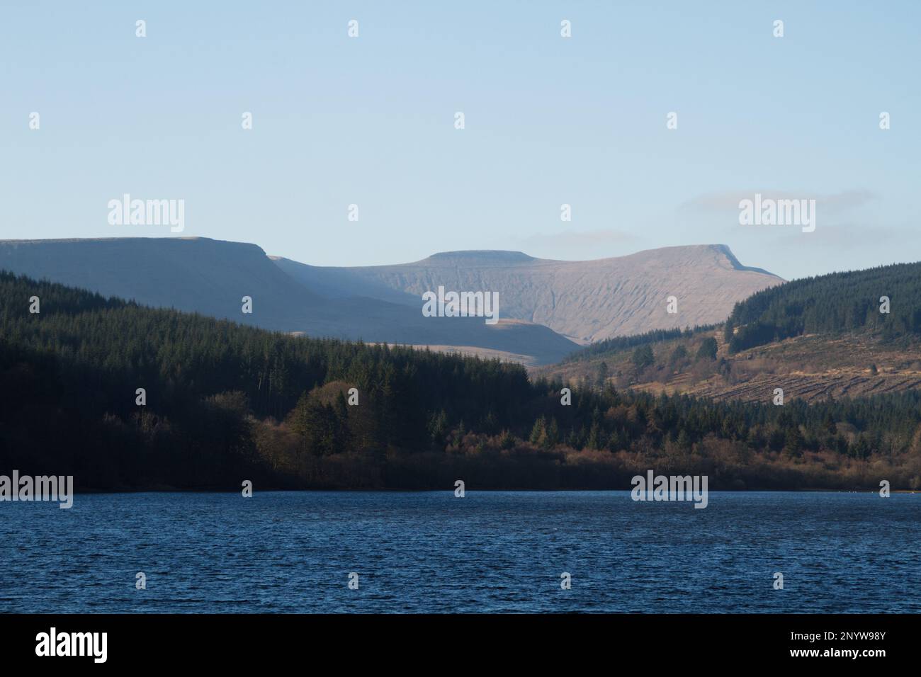 Pontsticill Reservoir, Merthyr Tydfil, South Wales, UK.  2 March 2023.  UK weather: Sunny scenes towards the Brecon Beacons this afternoon.  Credit: Andrew Bartlett/Alamy Live News. Stock Photo
