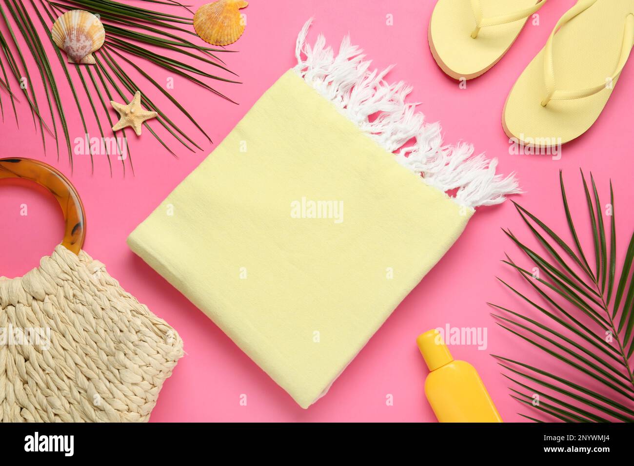 Flat lay composition with different beach objects on pink background Stock Photo