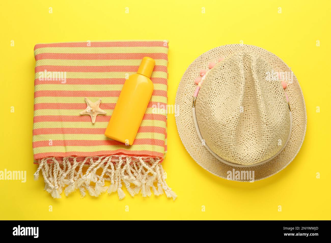 Flat lay composition with different beach objects on yellow background Stock Photo