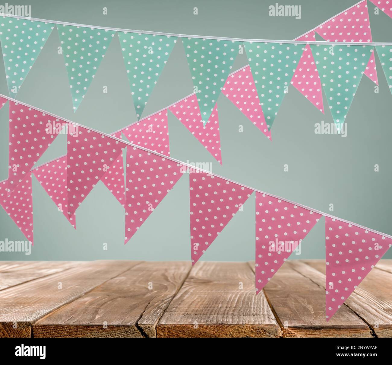 Empty wooden table and decorative bunting flags Stock Photo Alamy