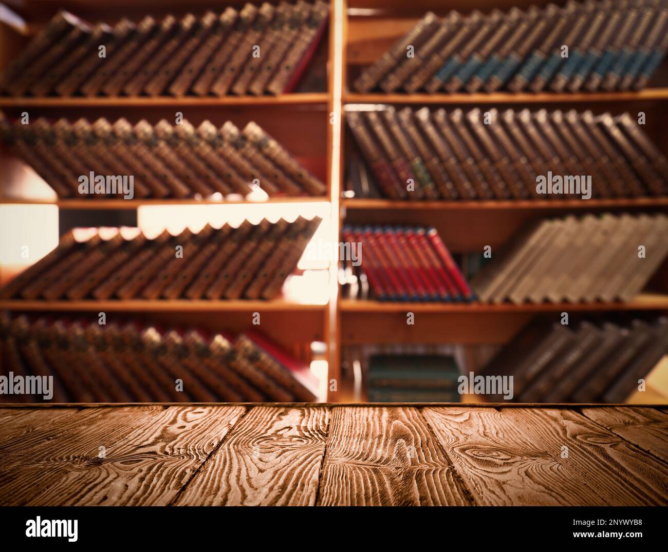Empty wooden table in library. Space for design Stock Photo - Alamy