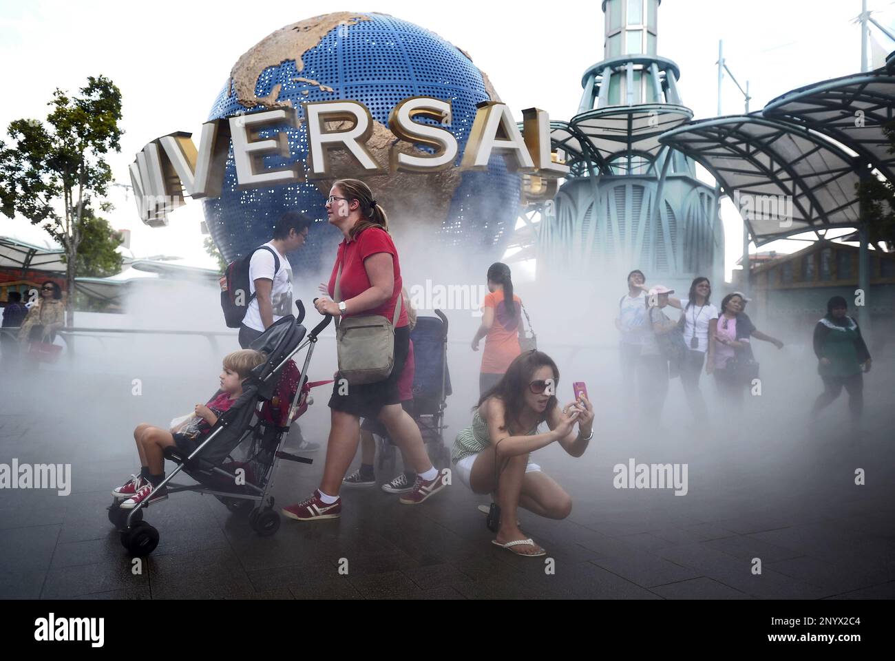 Tourists outside Universal Studios, Resorts World Sentosa (RWS ...