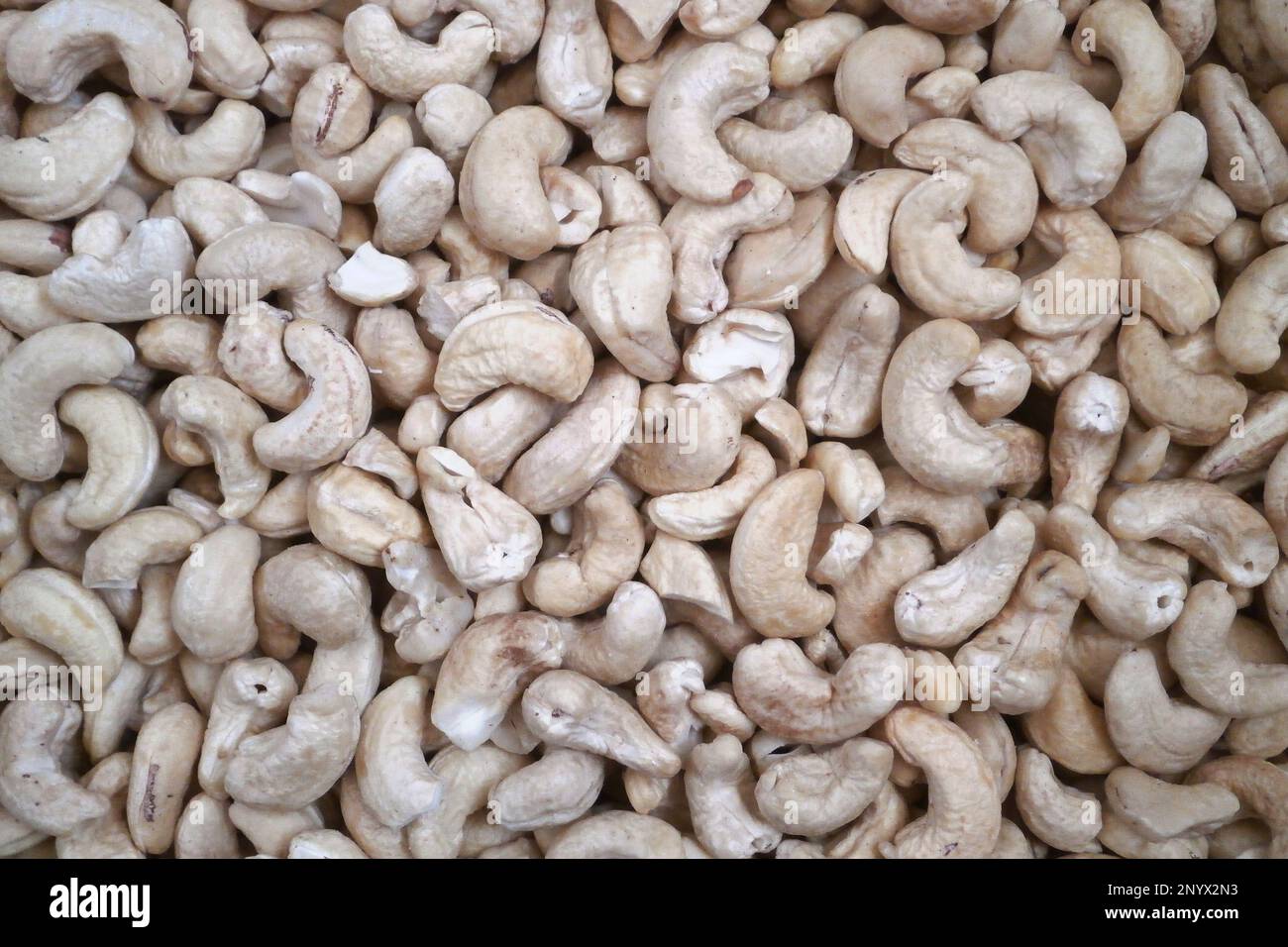 Closeup on a stack of cashew nuts for sale on a market stall Stock