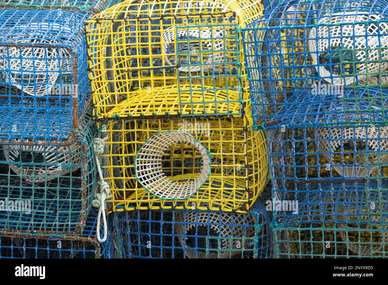 blue and yellow Lobster pots in southern Portugal Stock Photo