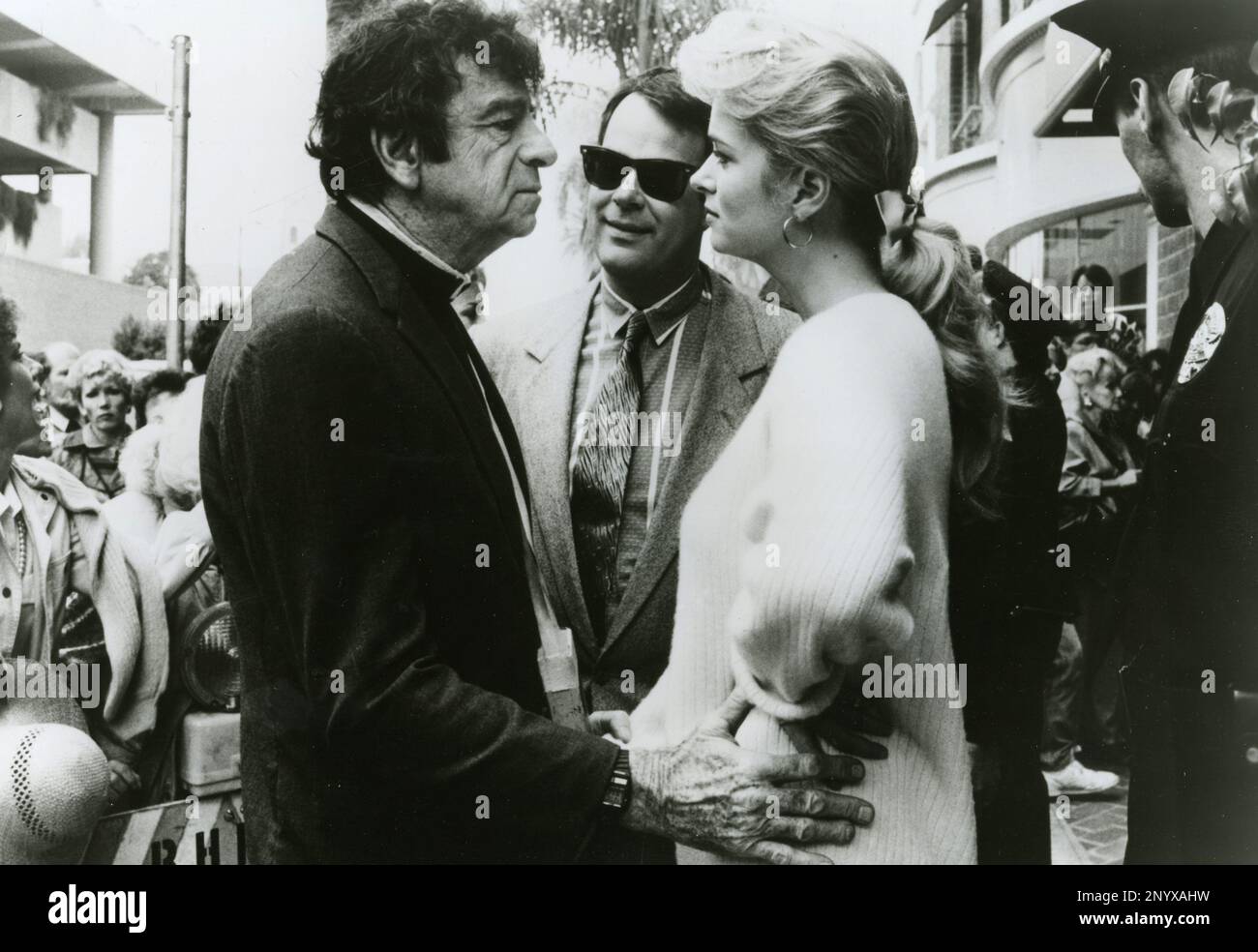 Actors Walter Matthau, Dan Aykroyd and Donna Dixon in the movie The
