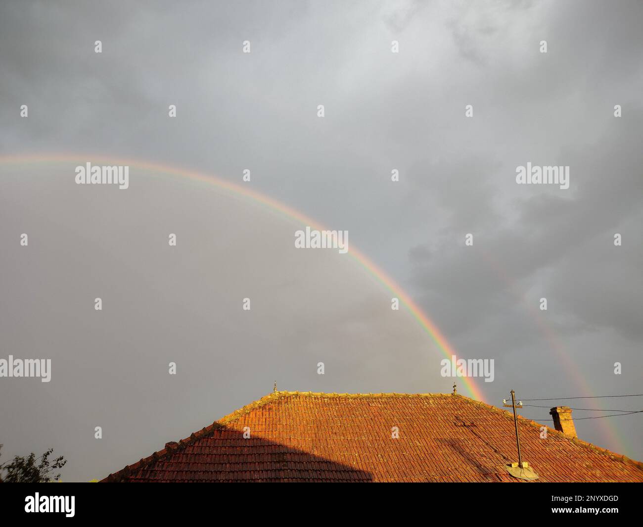 Natural rainbow after the rain in Maramures county, Romania Stock Photo ...