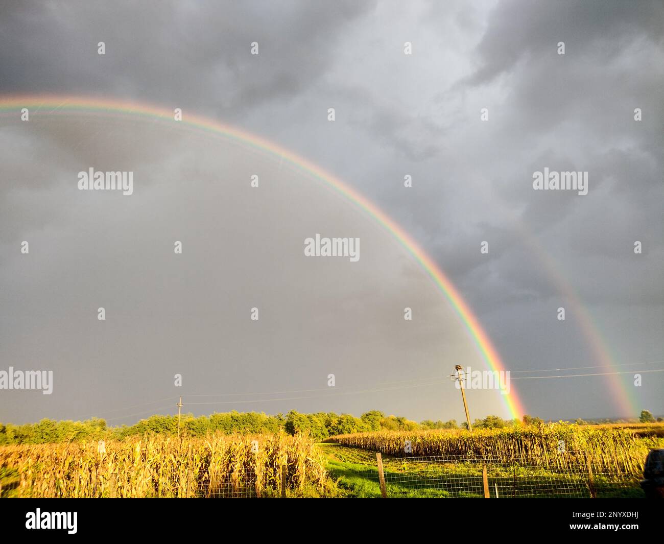 Natural rainbow after the rain in Maramures county, Romania Stock Photo ...