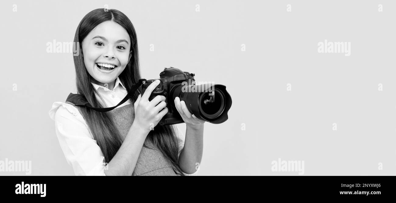 happy teen girl photographer use digital photo camera, photographing. Child photographer with